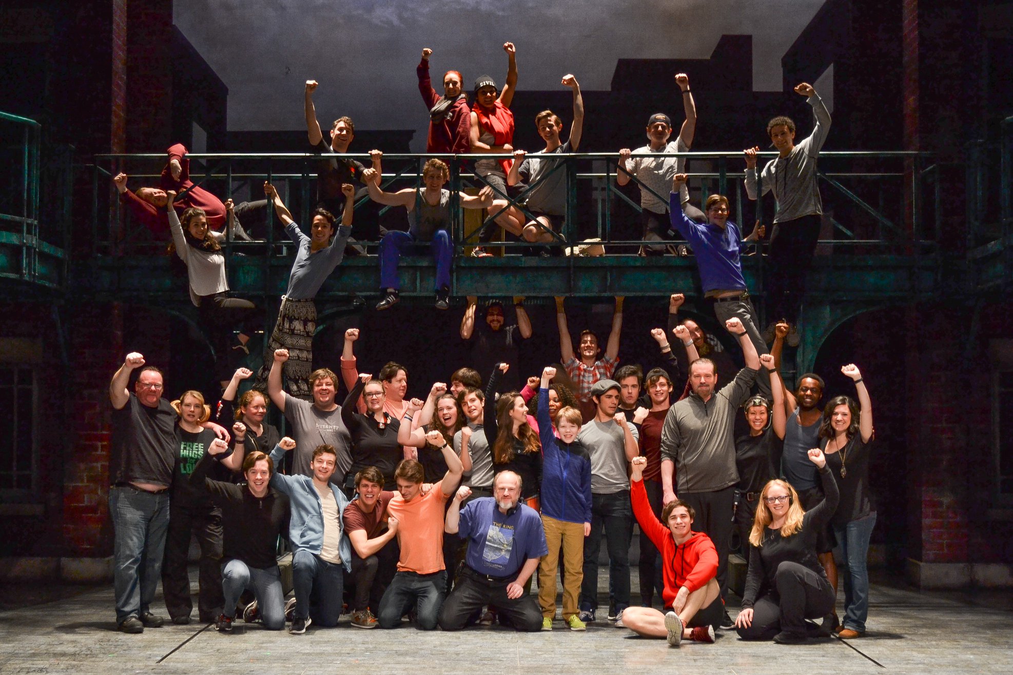 A crowd of actors on a stage. The cast of Newsies.
